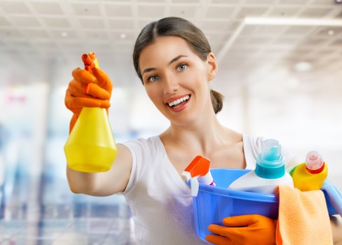 Team cleaning meeting rooms and shared office areas in central London