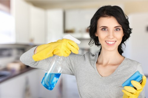 Cleaner applying carpet cleaning solution carefully