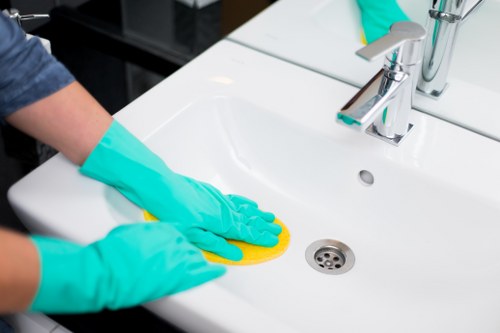 Bathroom descaling and sanitising as part of tenancy cleaning in EC2